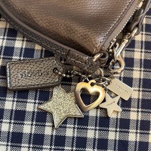 Coach Brown Pebbled Leather Wristlet with Silver Star & Heart Charms